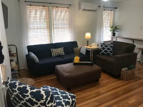 Adorable 1/1 upstairs garage apartment! - Image 2