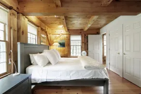 Get Cozy Under the Rustic Beams at a Woodland Hideaway - Image 3