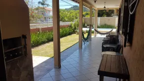 Casa de praia com piscina, churrasqueira e playground, à 250 metros da praia. - Image 4