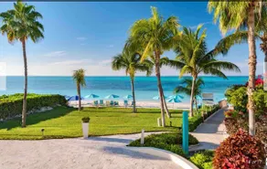 White House beachfront villa at Coral Gardens snorkeling reef - Image 2