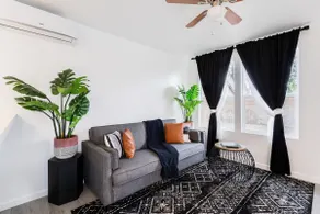 Striking Black & White Apt w Gated Entrance & Yard - Image 2