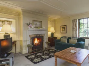 Historic manor house surrounded by mature gardens - Image 2