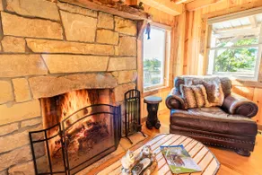 Amish-built cabin, serene and peaceful with pond and private dock for fishing. - Image 4
