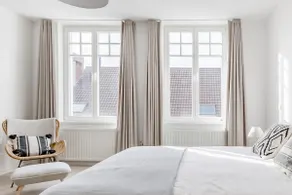 Overlook the City's Rooftops at a Bright, Bohemian Haven - Image 4