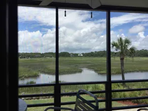 Location! -Peaceful Marsh-view w/ Screened Balcony - Image 3