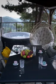 Romantic retreat with a hot tub. - Image 3