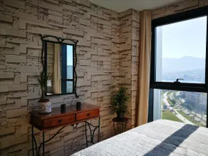 Beachfront with sea, city and mountain views - Image 2