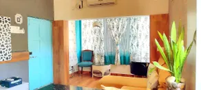 1bhk fully AC cozy condo with Backyard view - Image 2