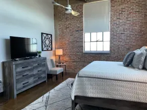 A Downtown Loft with a corner view! - Image 4
