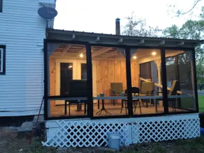 Experience the charm of a rustic lakefront cottage, perfect for year-round fun! - Image 2