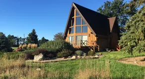 Relaxing Riverview Cabin with Scenic Hot Tub - Image 1
