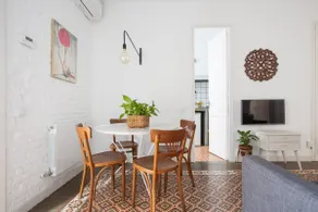 Surya BCN Apartment: Sun, relaxation, and Modernism. - Image 4
