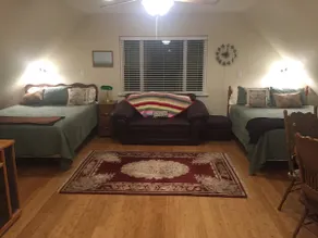 Cozy cabin-like studio above freestanding garage - Image 3