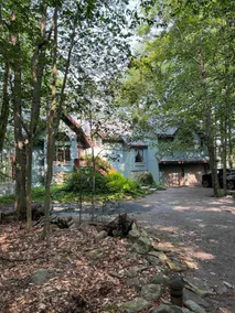 Lakefront Chalet with Private Beach and Hot Tub - Image 3