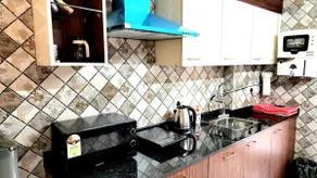 Cozy 1BHK with Double Wi-Fi | Work & Relax w. Pool - Image 2