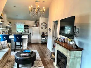 The Suburban Farmhouse\" where old meets new. - Image 2