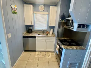 ** Rez-de-chaussée DIRECT BEACHFRONT chalet ** Sortez la porte et dans le sable !!** - Image 4