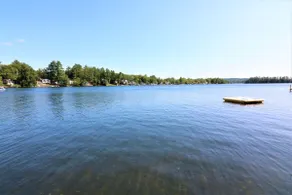 Winnisquam Lakeside Funky Ski Chalet w-Sandy Beach & Boat Docks - Image 2