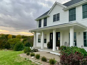 Secluded, spacious, hilltop acreage home with stunning views of Omaha skyline - Image 3