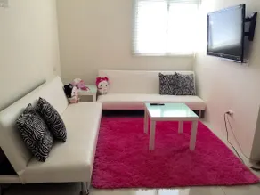 Family room in the middle floor of a 4-6 person building - Image 3