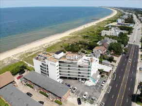 See dolphins from this Lg beachfront condo - Image 2