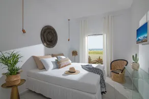 Stroll barefoot to the beach from a boho tiny home - Image 2