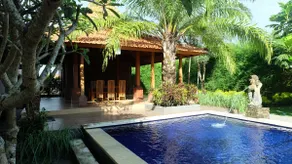 Pujis Homestay with a private pool and garden view - Image 2