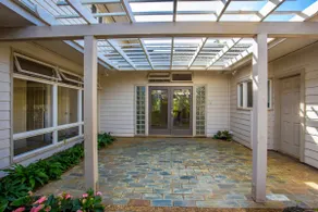 Large spacious home with A/C! Walk to Beach/Pool - Image 3