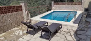 2 bedroom mountain retreat with pool and sea views - Image 4