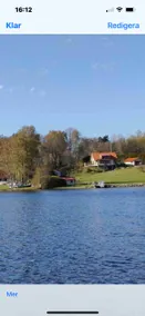The house by the lake with its own jetty and boat. - Image 2