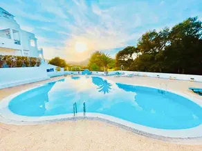 Surrounded by nature, a swimming pool and the beach is very close - Image 2