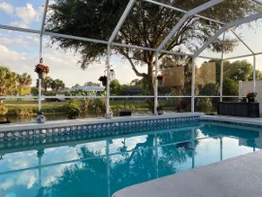 Tropical Canal Retreat with Gorgeous Pool - Image 3
