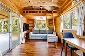 A pristine white log house located next to the untouched White Beach. Ideal for long-term stays! - Image 2