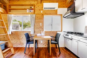A pristine white log house located next to the untouched White Beach. Ideal for long-term stays! - Image 4