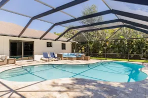 Stylish 3BR w/ Heated Pool · 7 Mins to Beach - Image 2
