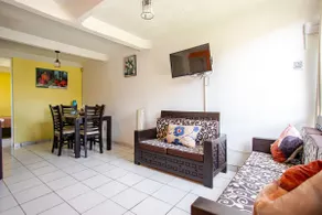 Cozy 3BR Home: Pool, Safety, Parking - Image 2