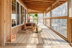 Cozy Wraparound Deck Overlooking Peaceful Creek - Image 3