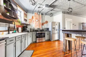 Exposed Brick and Plaster at an Industrial Loft - Image 4