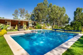 Country house with a swimming pool, terrace, and green areas - Image 3