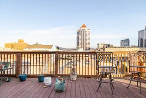 2-bedroom penthouse with rooftop deck and garage - Image 2