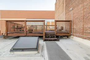 2-bedroom penthouse with rooftop deck and garage - Image 4