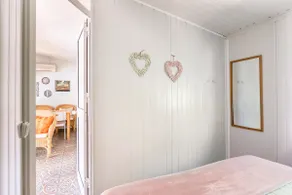 A cozy guest house with a pool and garden - Image 3