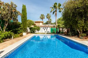 A cozy guest house with a pool and garden - Image 2