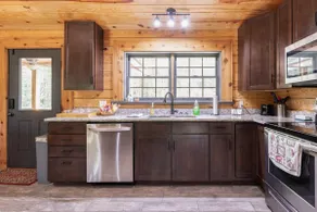Secluded Waterfront Cabin Retreat - Image 5
