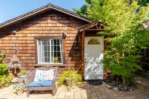 Soak up the Serenity on the Patio of a Charming Cottage - Image 2
