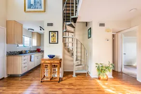 Elegant riverside condo minutes from downtown - Image 4