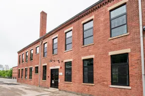Jennifer's Historic Loft Glass Bedroom - Image 4