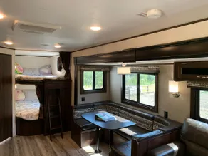 Into the Woods 32’ Camper with Slide-Out, Hot Tub - Image 2