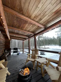 Rustic log cabin nestled in the woods - Image 5