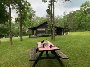 Cozy Log Cabin on Lake w/ Mountain Views - Image 2